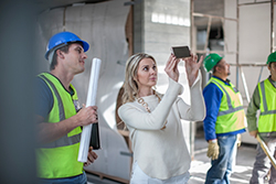 Contractors and owner reviewing work; Ocean County SEO makes these jobs possible for local contractors