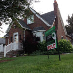 Homes for sale in Middletown NJ are a great investment like this brick home with a SOLD sign out front